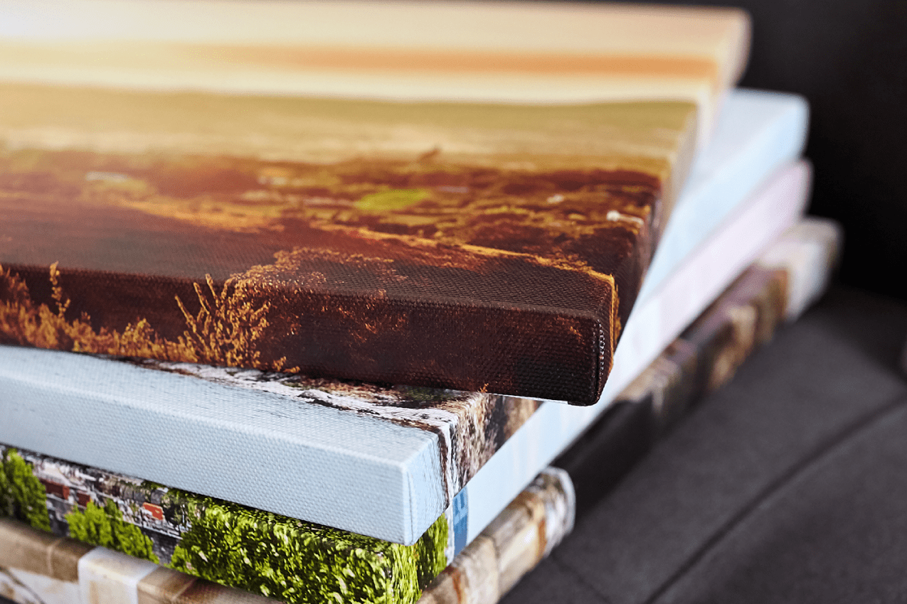 Interior design with photoframes and yellow couch<br />